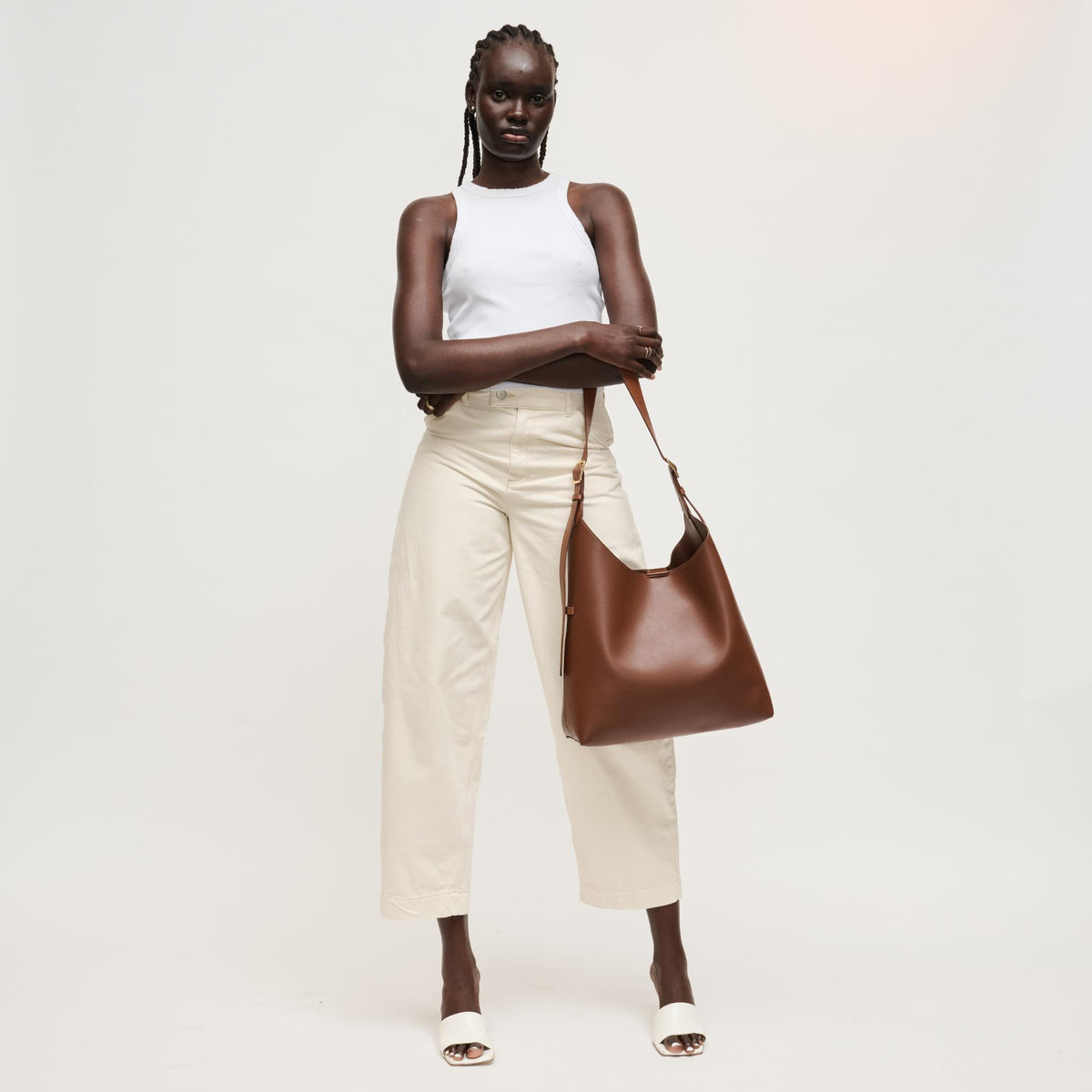 Woman wearing Chocolate Urban Expressions Maria Hobo 840504206269 View 4 | Chocolate