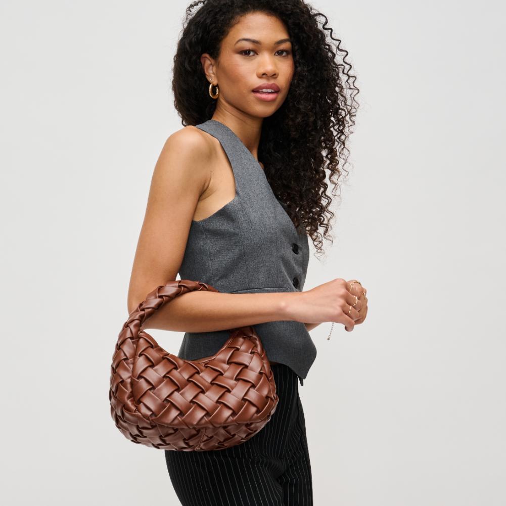Woman wearing Chocolate Urban Expressions Noreen Clutch 840611193698 View 2 | Chocolate