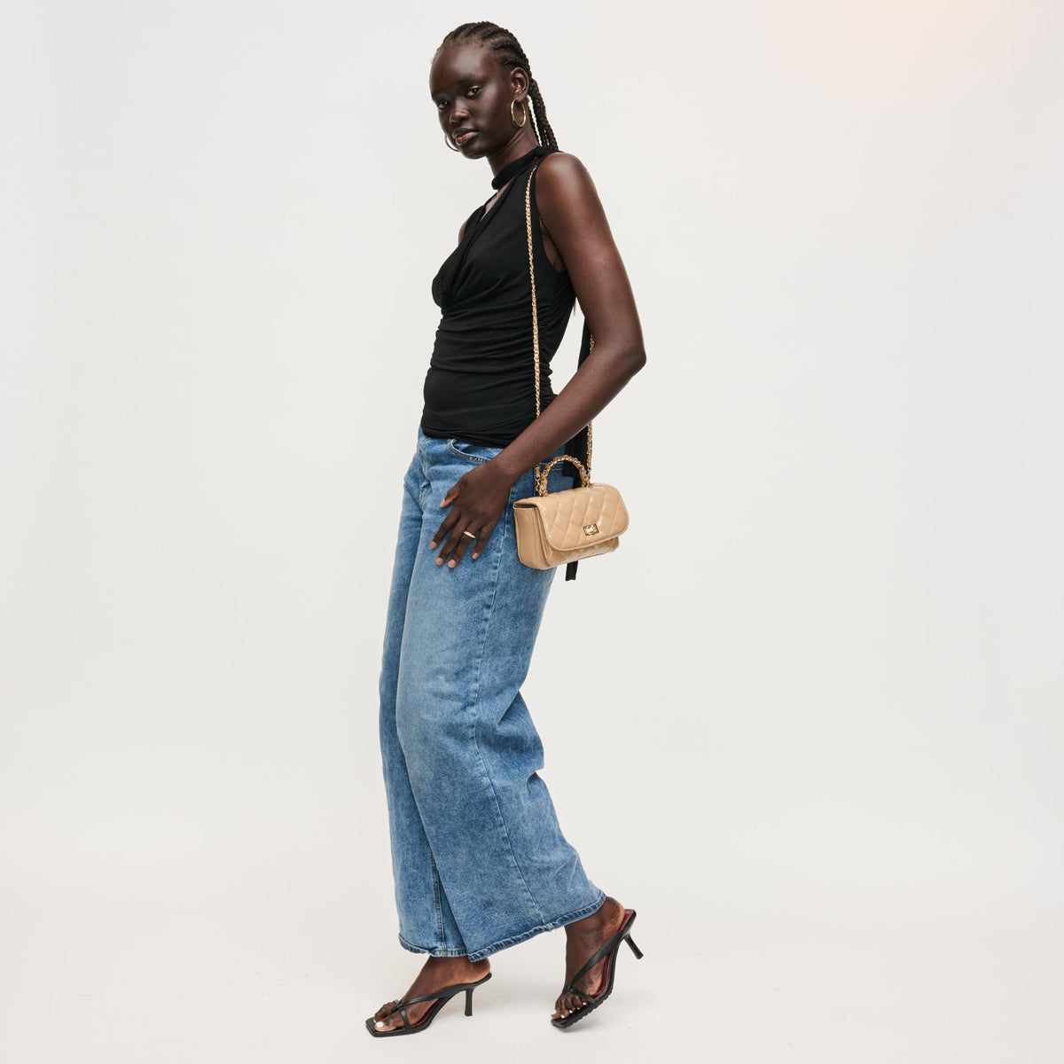 Woman wearing Natural Urban Expressions Leo Crossbody 840504205071 View 2 | Natural