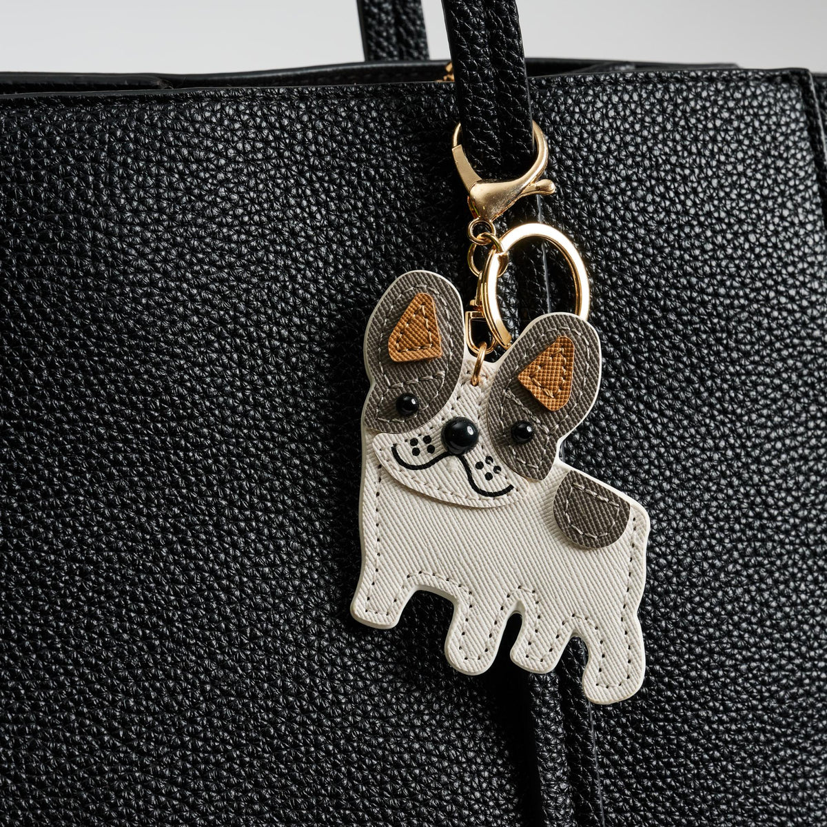Woman wearing Grey Urban Expressions Zero Keychain Charm 840611150738 View 1 | Grey