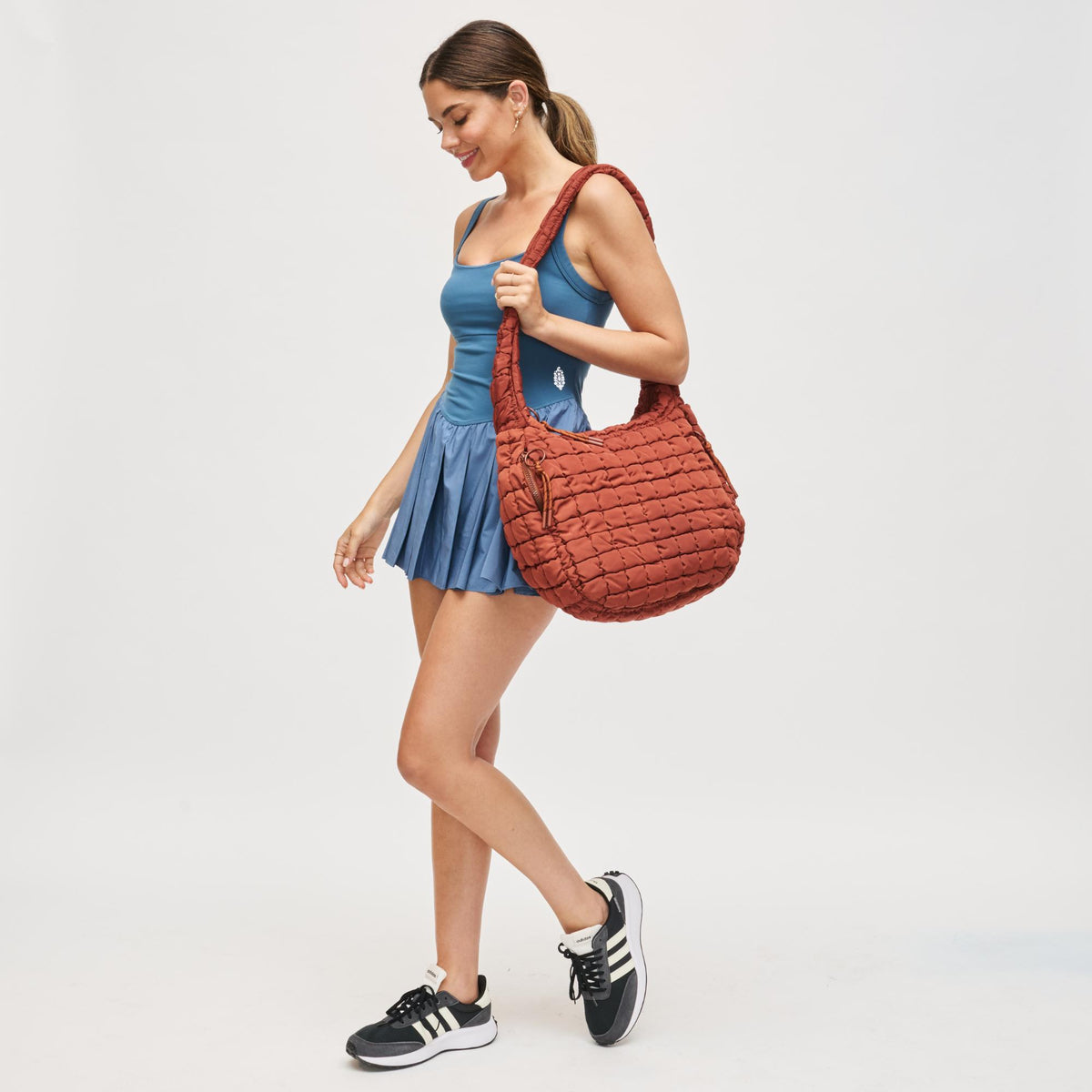 Woman wearing Rust Urban Expressions Tamsin - Quilted Puffer Hobo 840504200519 View 4 | Rust