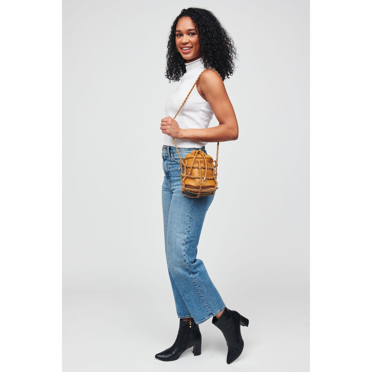 Woman wearing Caramel Urban Expressions Moira Crossbody 818209012324 View 3 | Caramel