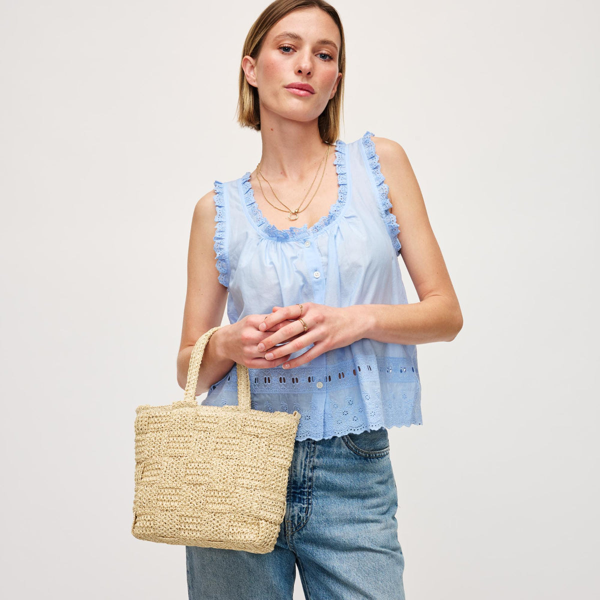Woman wearing Ivory Urban Expressions Chiara Crossbody 840611158574 View 1 | Ivory
