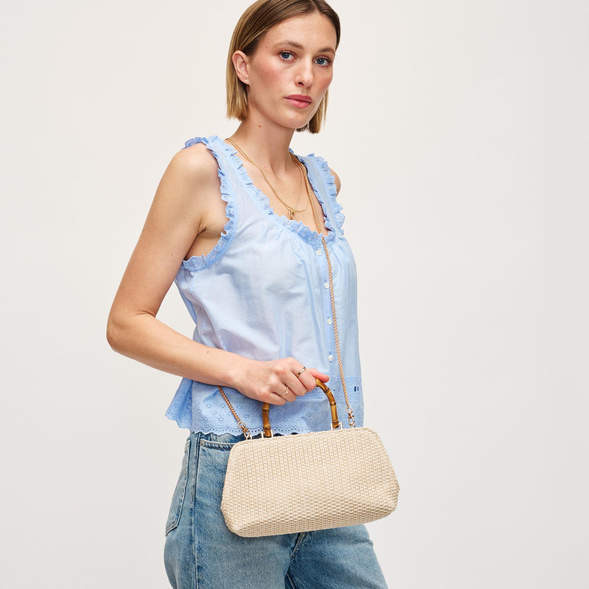 Woman wearing Ivory Urban Expressions Lucy - Straw Crossbody 840611154385 View 3 | Ivory