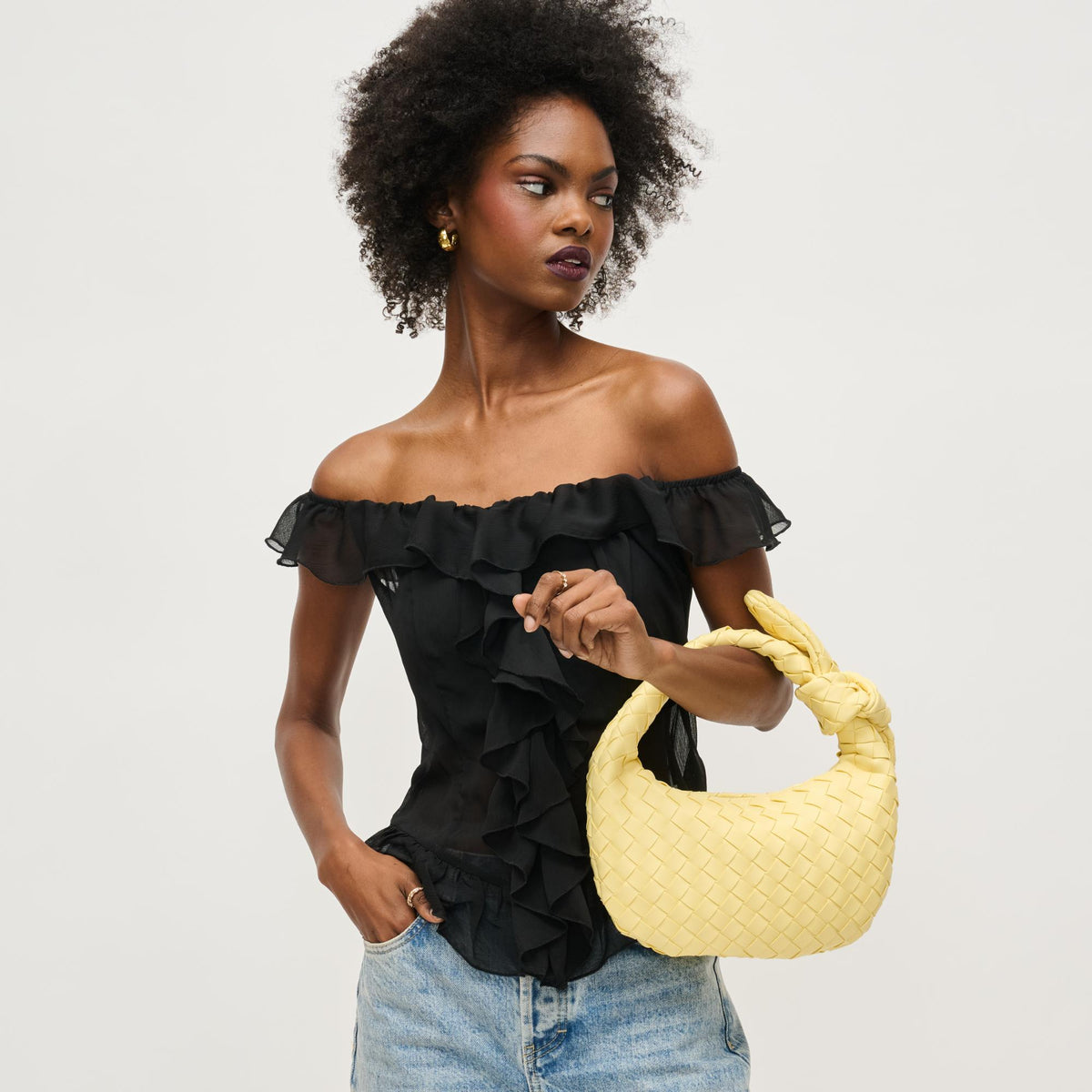 Woman wearing Butter Urban Expressions Lizbeth Clutch 840611148056 View 1 | Butter