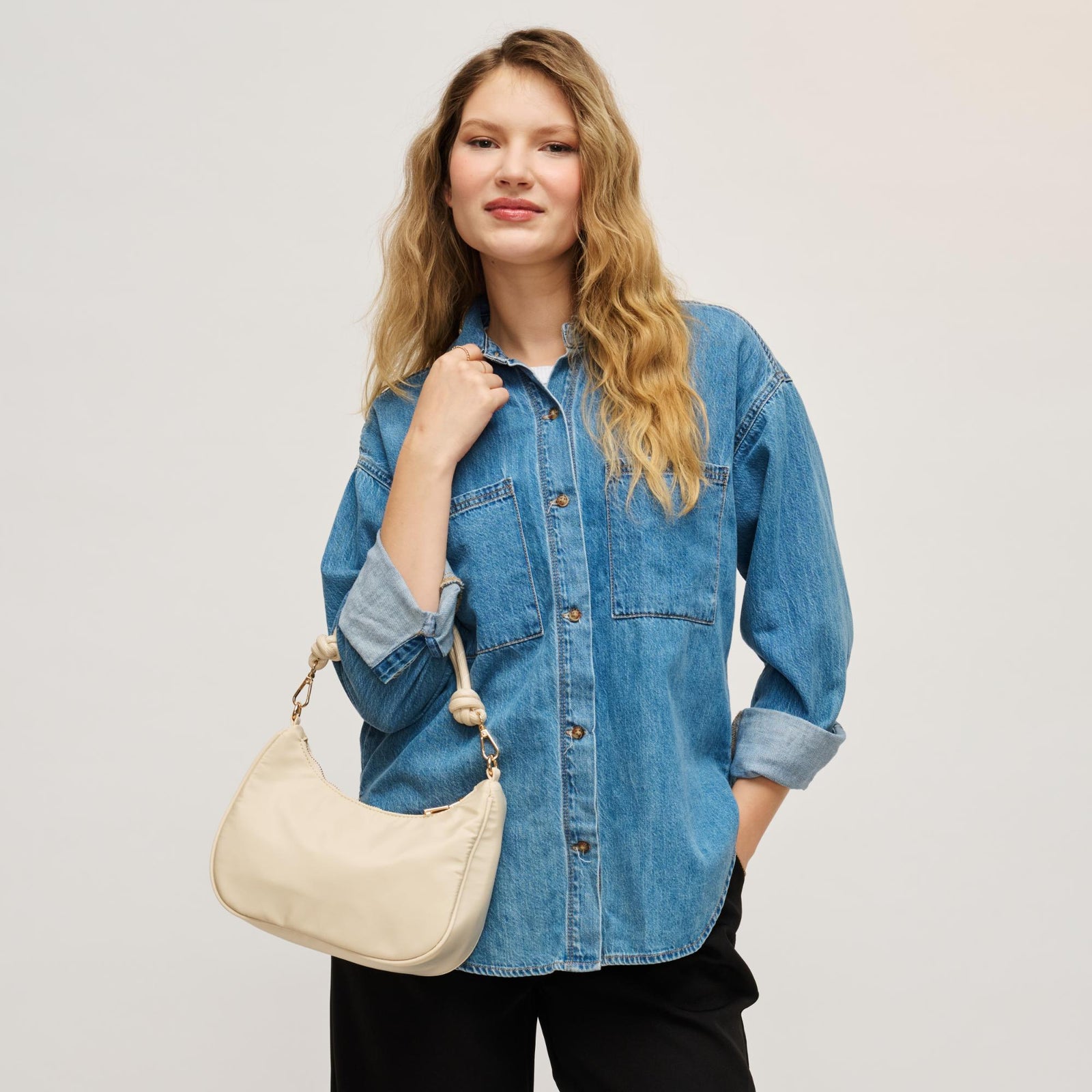 Woman wearing Sage Urban Expressions Joannie Crossbody 840504208683 View 1 | Sage
