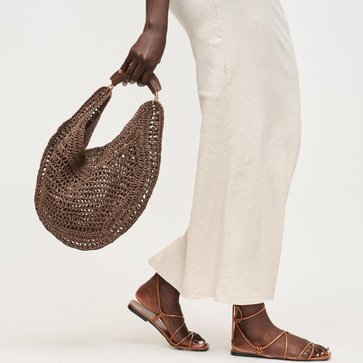 Woman wearing Chocolate Urban Expressions Camden Hobo 840504202995 View 2 | Chocolate