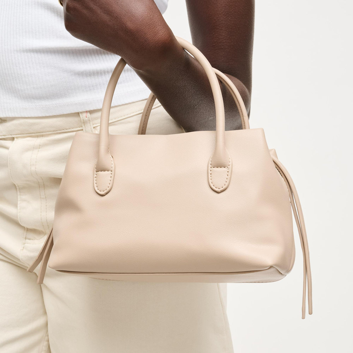 Woman wearing Stone Urban Expressions Logan Crossbody 840504205378 View 1 | Stone