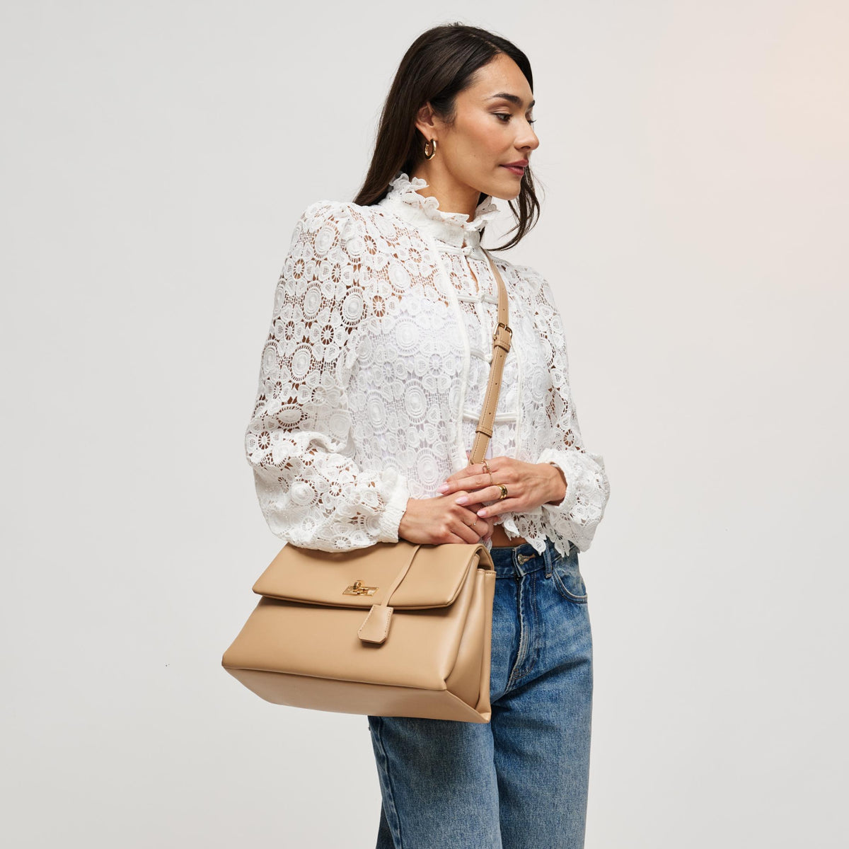 Woman wearing Natural Urban Expressions Arrow Satchel 840504212949 View 1 | Natural