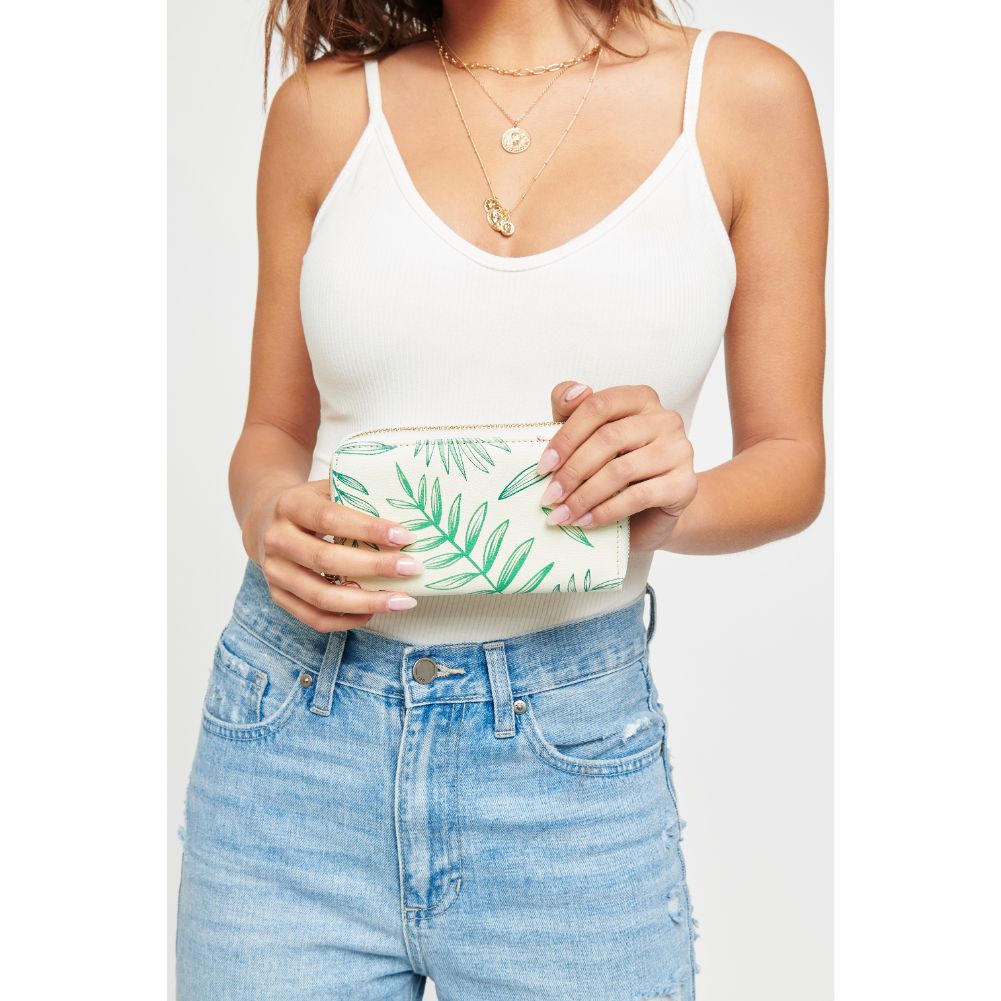 Woman wearing Ivory Multi Urban Expressions Hula Wallet 840611145277 View 2 | Ivory Multi