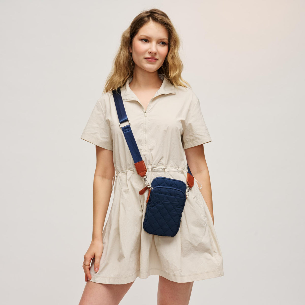 Woman wearing Navy Tan Urban Expressions Vesna Crossbody 840504206054 View 1 | Navy Tan