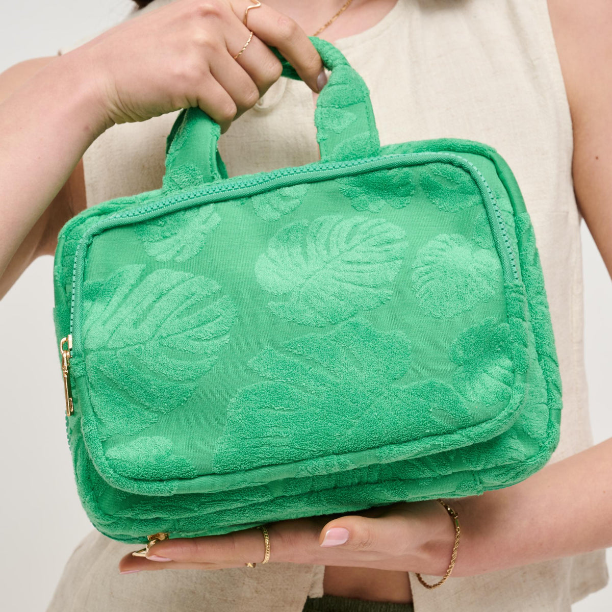 Woman wearing Green Urban Essentials Tropical Dreams Travel Organizer 840611195234 View 1 | Green