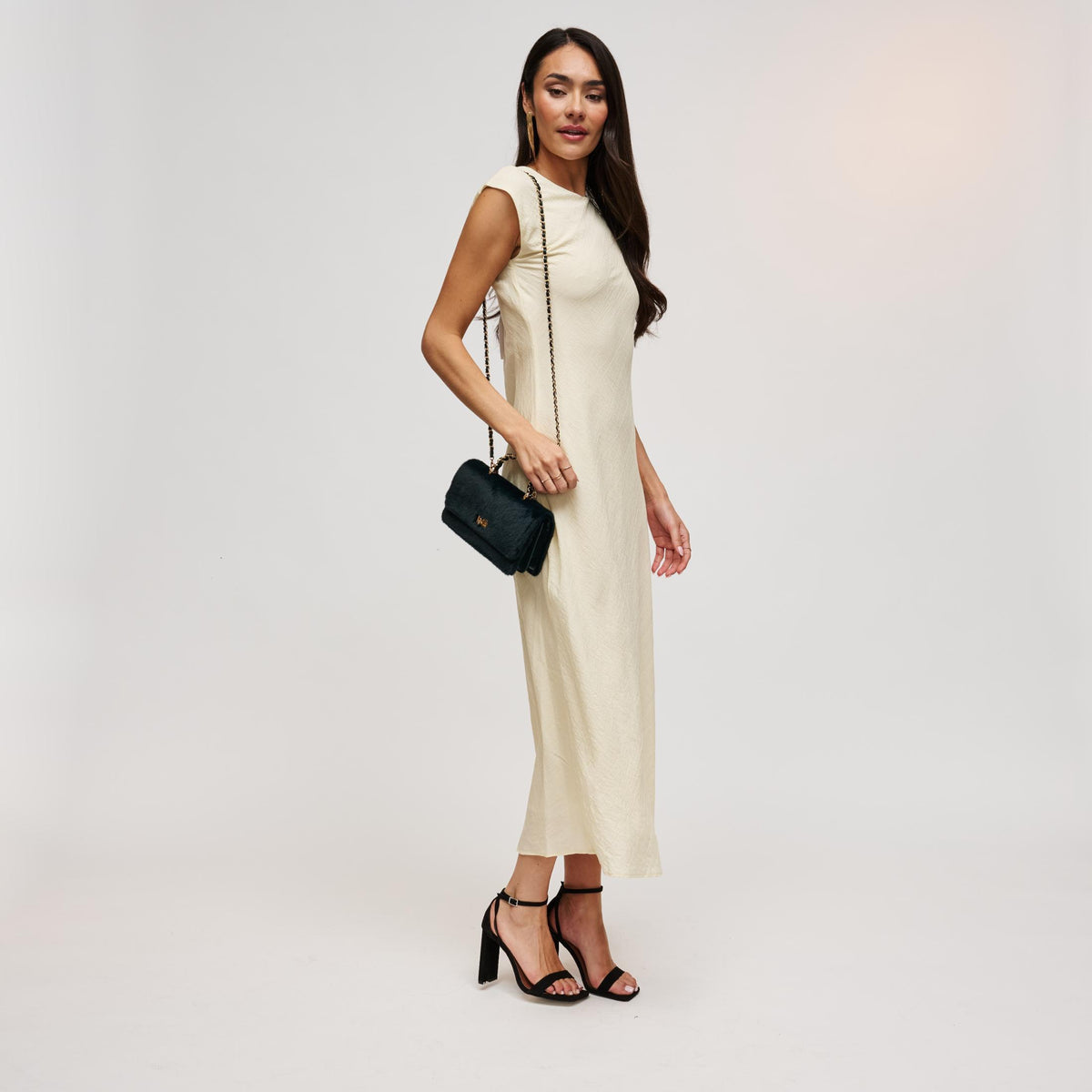 Woman wearing Emerald Urban Expressions Lulu - Fur Crossbody 840504212413 View 4 | Emerald