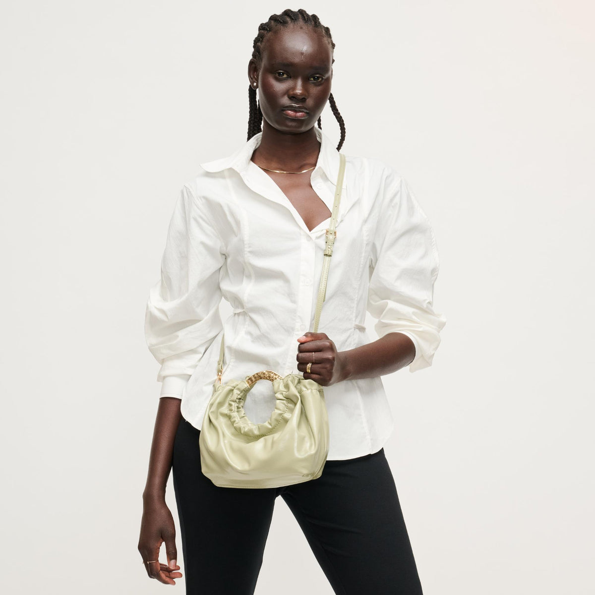 Woman wearing Sage Urban Expressions Myles Crossbody 840504204739 View 3 | Sage