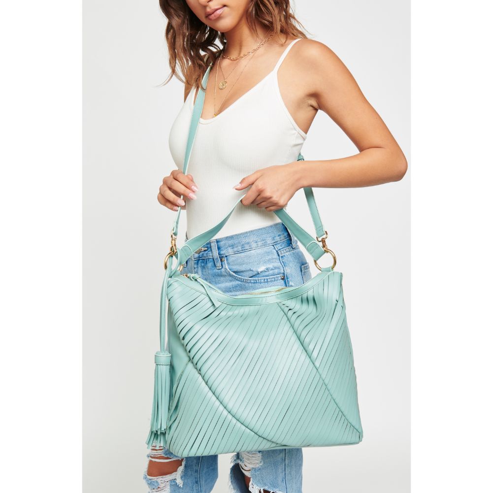 Woman wearing Sage Urban Expressions Jinx Hobo NA-840611124982 View 1 | Sage