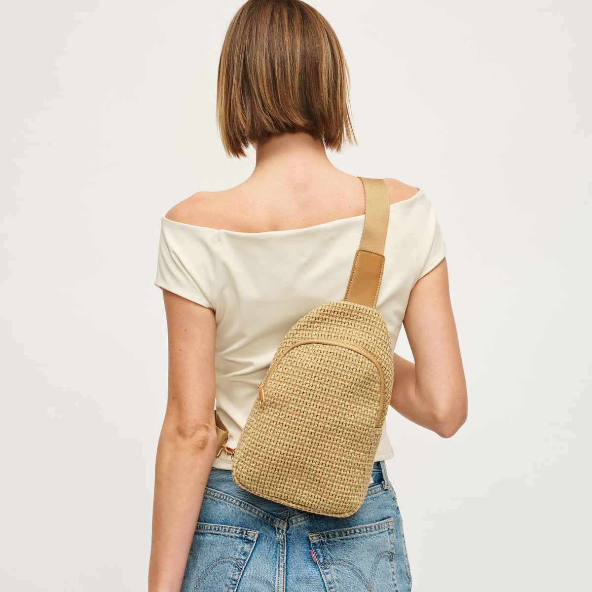 Woman wearing Natural Urban Expressions Jean Sling Backpack 840611146533 View 3 | Natural