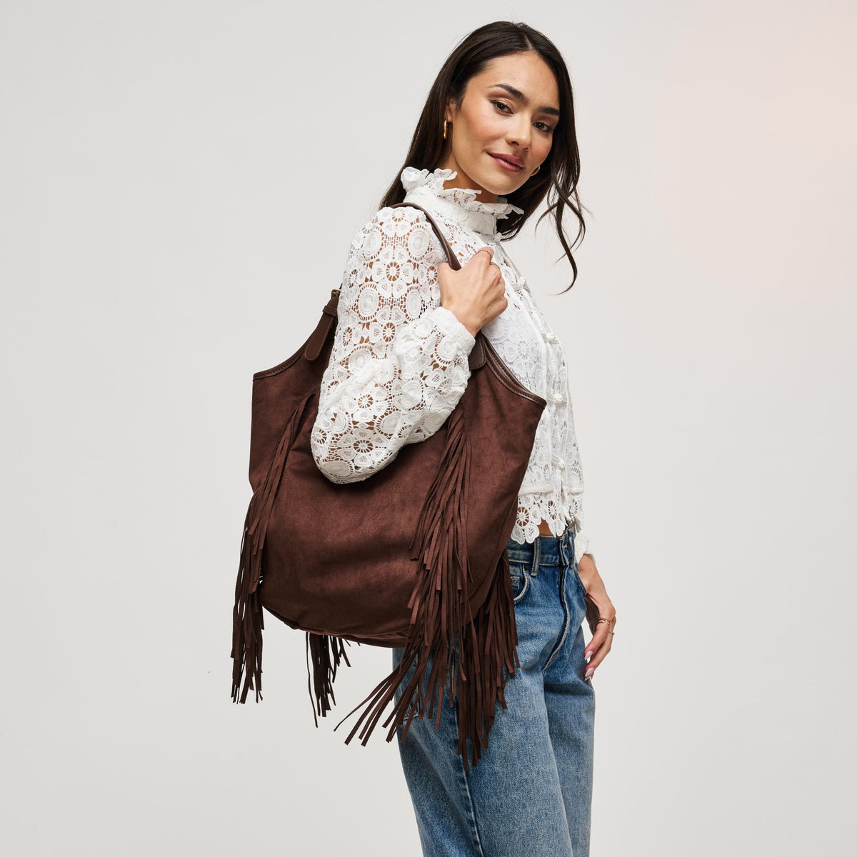 Woman wearing Chocolate Urban Expressions Nyxie Tote 840504211553 View 1 | Chocolate