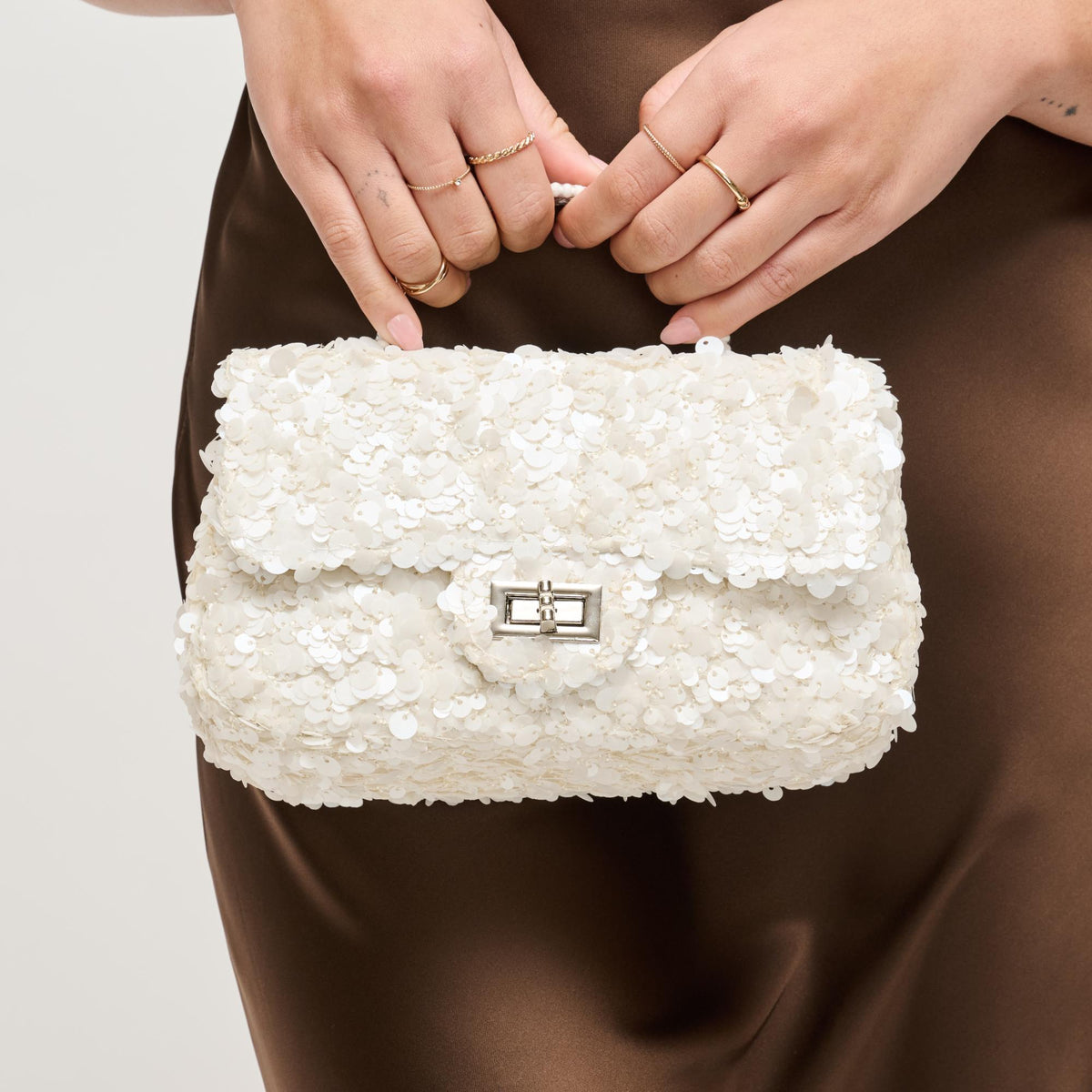 Woman wearing Ivory Urban Expressions Ella Evening Bag 840504204340 View 1 | Ivory