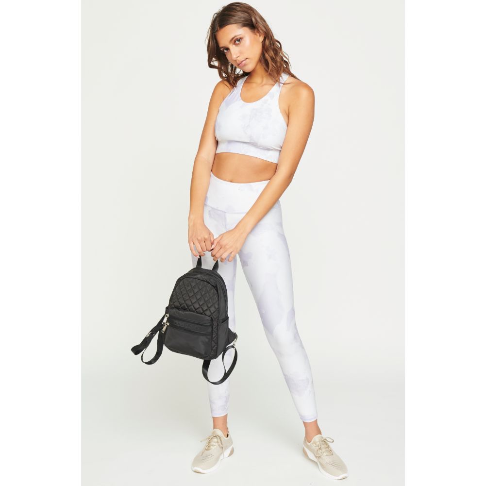 Woman wearing Black Urban Expressions Brynlee Sling Backpack 840611180452 View 2 | Black
