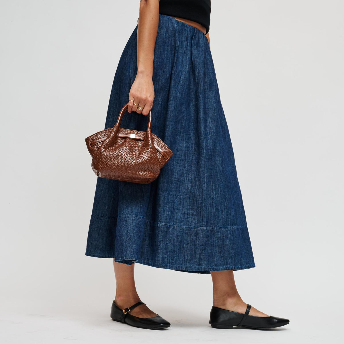 Woman wearing Cognac Urban Expressions Selena - Embossed Woven Crossbody 840504212154 View 3 | Cognac