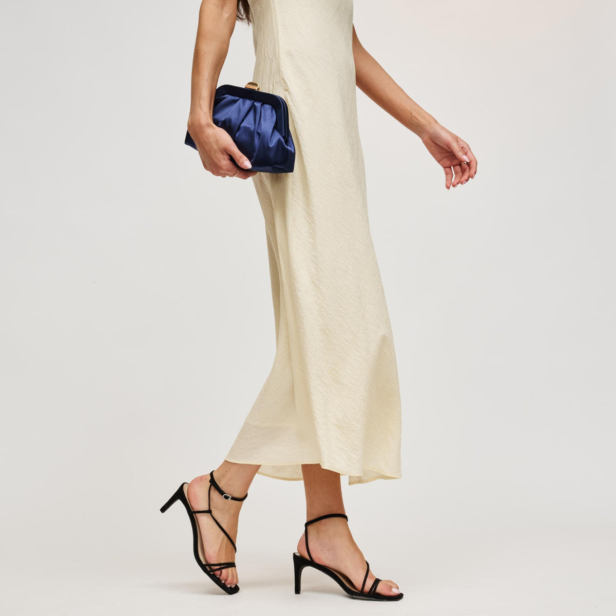 Woman wearing Midnight Urban Expressions Winter Clutch 840504211720 View 3 | Midnight