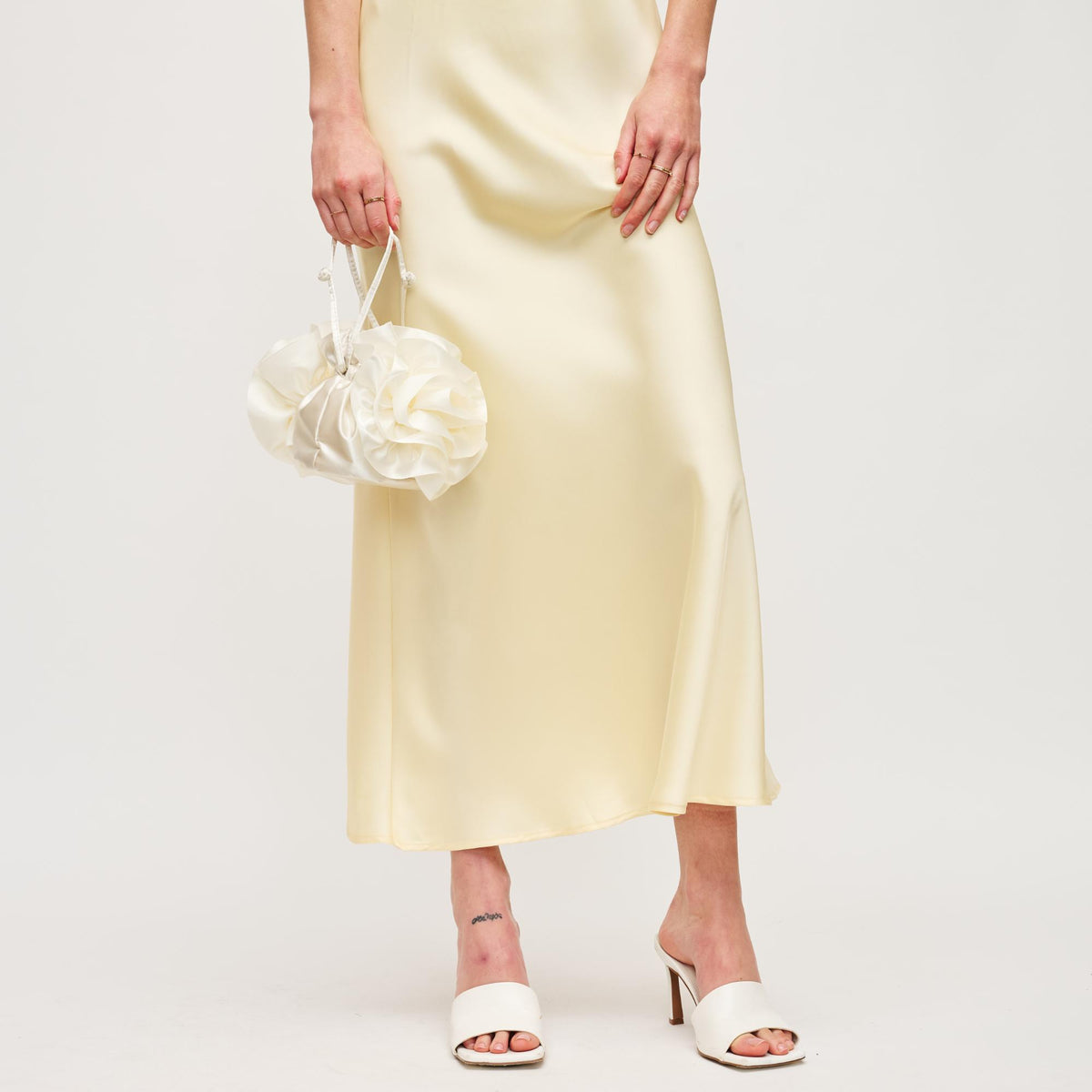 Woman wearing Ivory Urban Expressions Fleur Luxe Evening Bag 840611149800 View 3 | Ivory