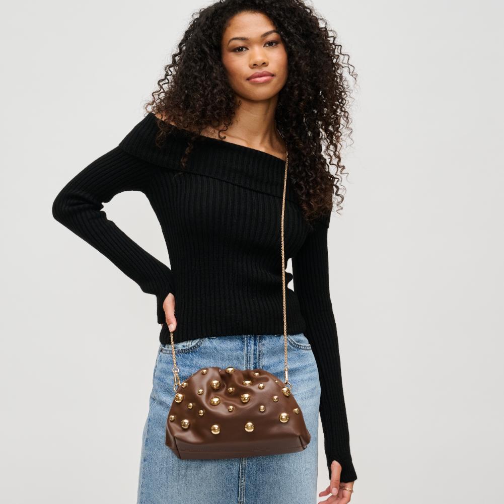 Woman wearing Chocolate Urban Expressions Carey Clutch 840611193803 View 1 | Chocolate