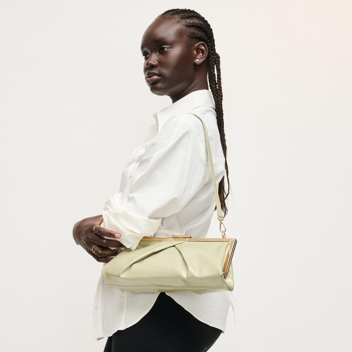 Woman wearing Sage Urban Expressions Scottie Crossbody 840504207983 View 3 | Sage