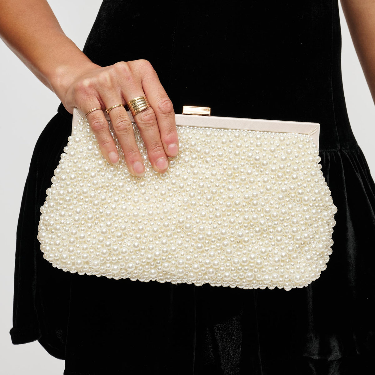 Woman wearing Ivory Urban Expressions Samira Evening Bag 840611193629 View 1 | Ivory
