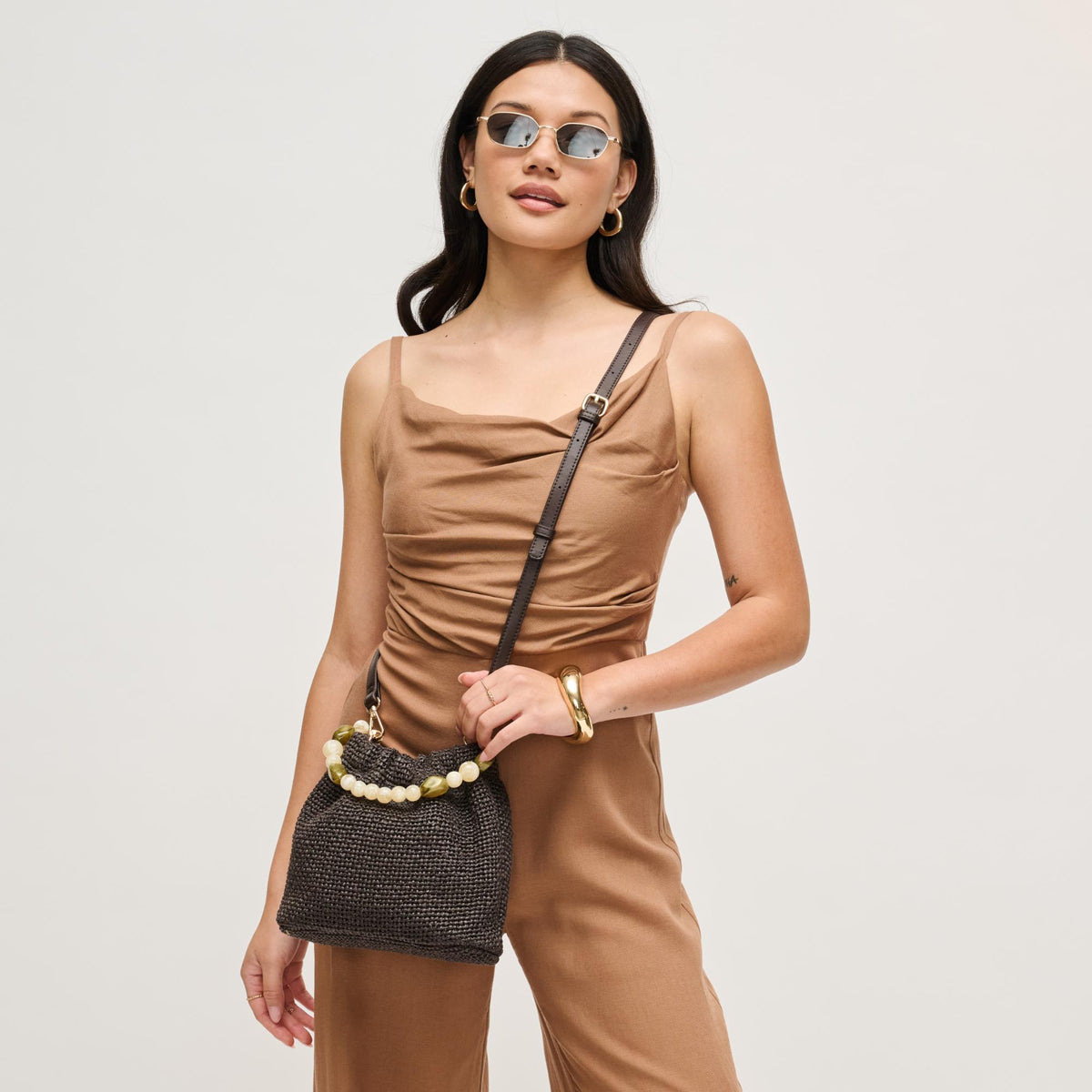 Woman wearing Chocolate Urban Expressions Emery Crossbody 840504206368 View 2 | Chocolate