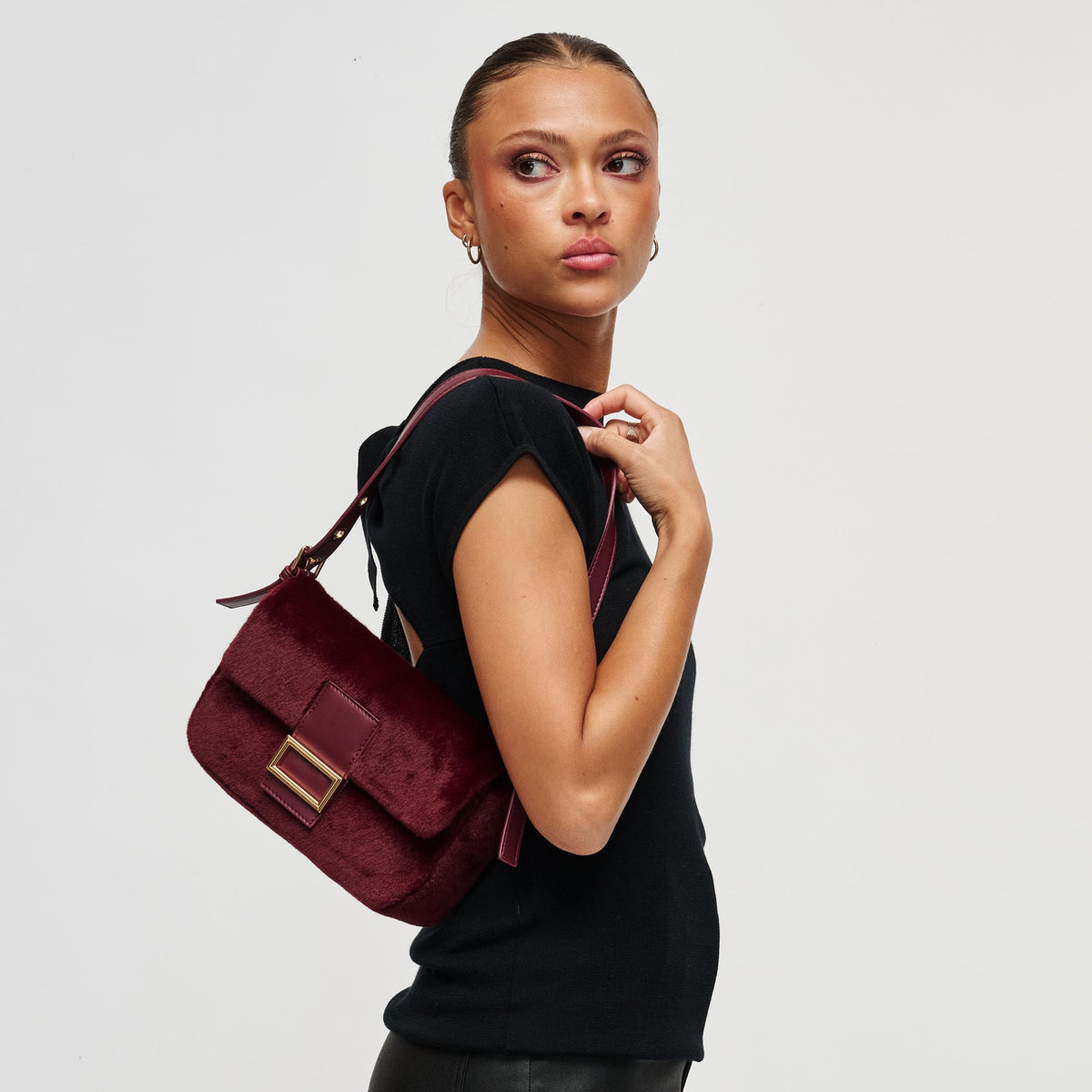 Woman wearing Burgundy Urban Expressions Beverly - Faux Fur Crossbody 840504212482 View 2 | Burgundy