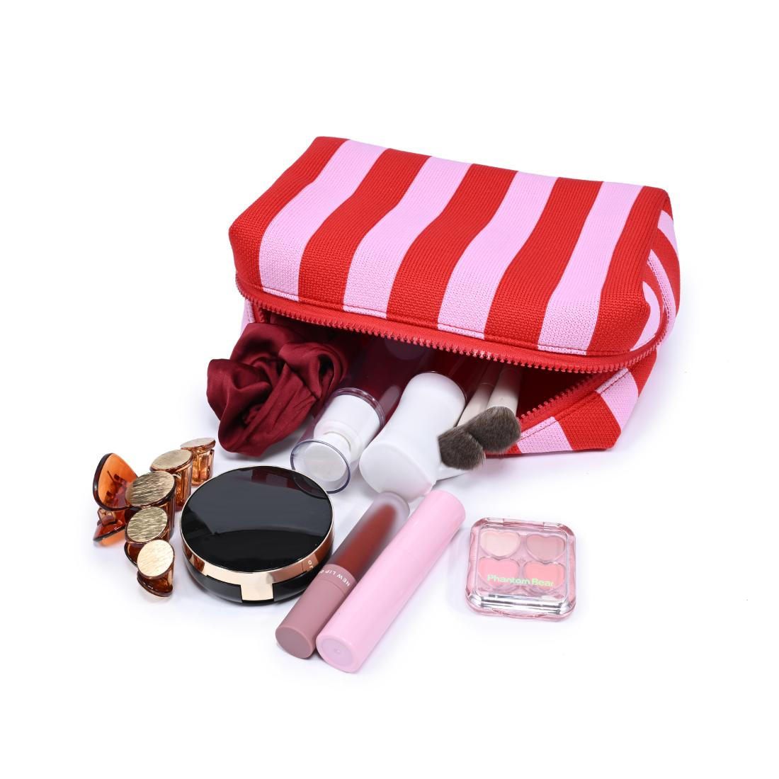 Woman wearing Red Pink Urban Essentials Essential Stripe Cosmetic & Travel Organizer Pouch 840504207396 View 1 | Red Pink