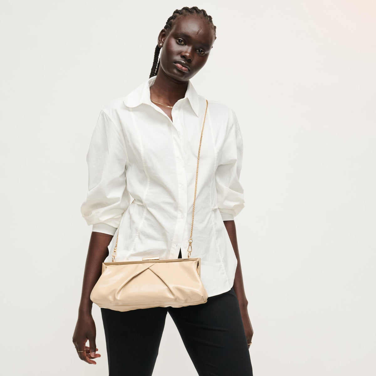 Woman wearing Nude Urban Expressions Scottie Crossbody 840504207990 View 2 | Nude