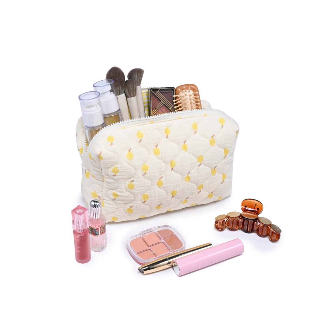 Woman wearing Lemon Urban Essentials Quilted Keeper Cosmetic & Travel Organizer Pouch 840611195432 View 1 | Lemon