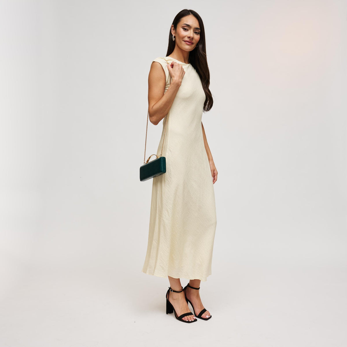 Woman wearing Emerald Urban Expressions Banks Clutch 840504212093 View 3 | Emerald