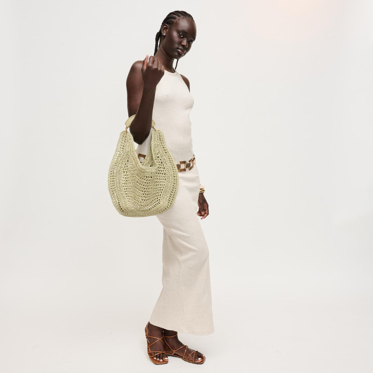 Woman wearing Sage Urban Expressions Camden Hobo 840504204500 View 3 | Sage
