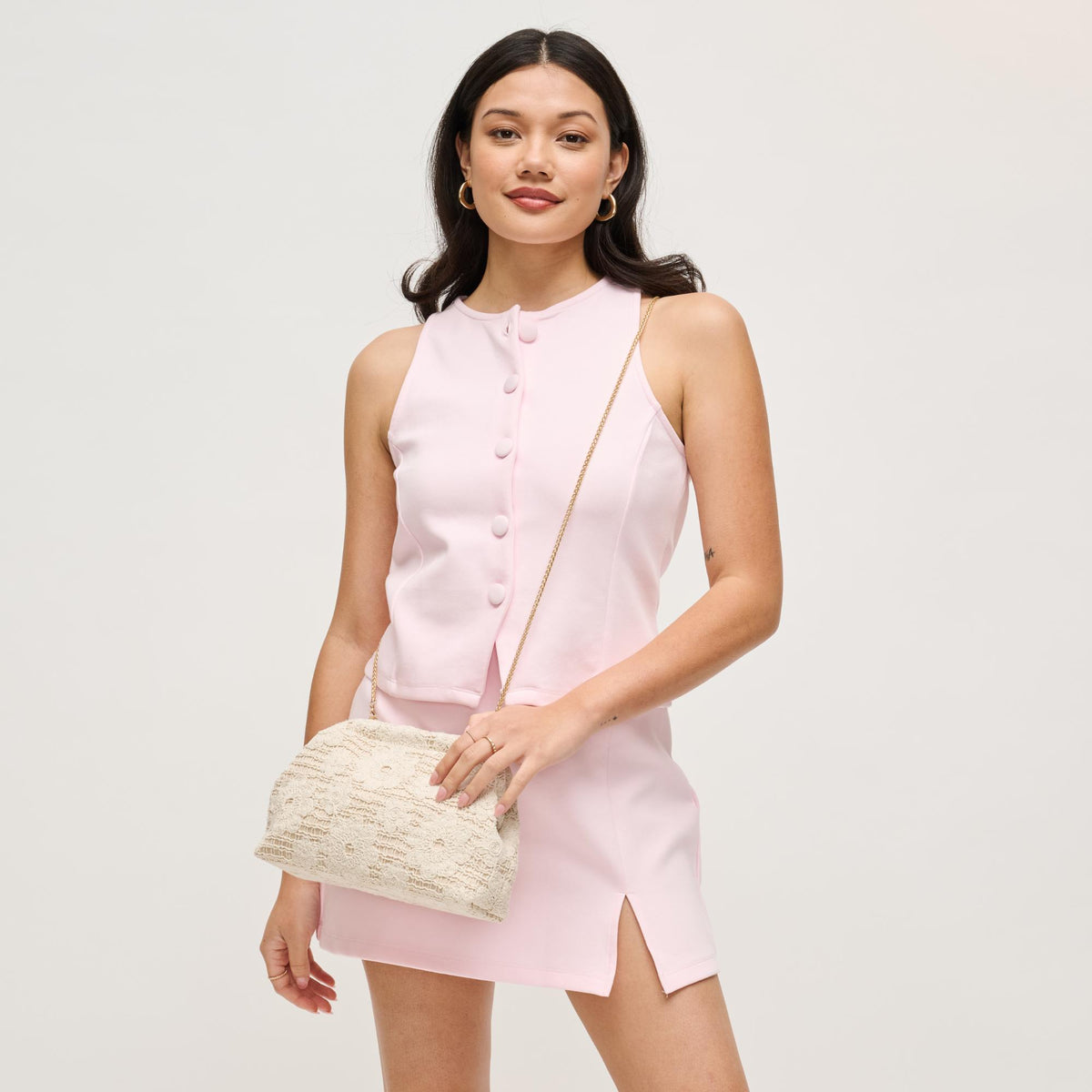 Woman wearing Ivory Urban Expressions Ophelia Clutch 840504204487 View 2 | Ivory