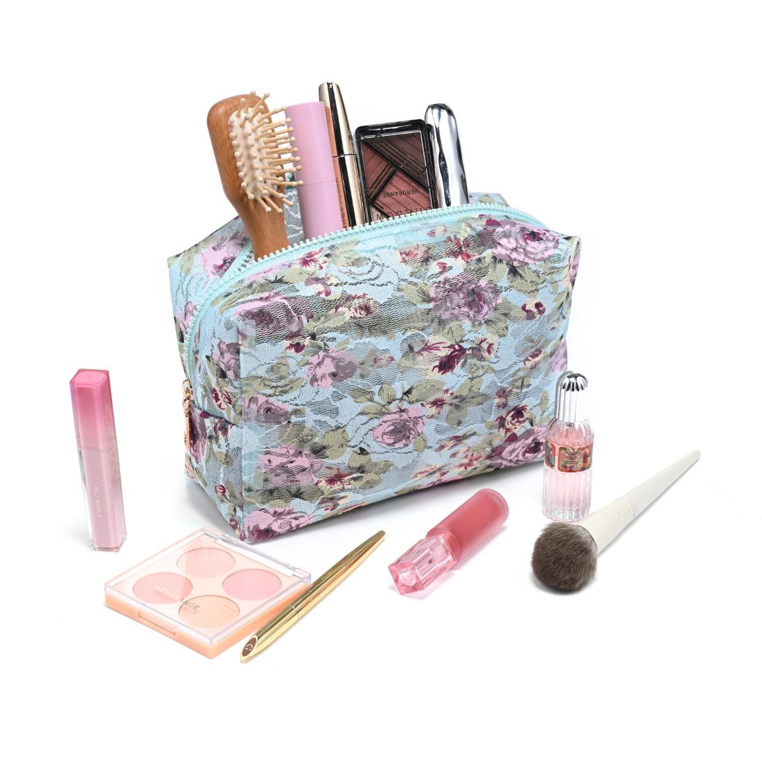 Woman wearing Powder Blue Urban Essentials Petal Play Cosmetic & Travel Organizer Pouch 840504207464 View 1 | Powder Blue