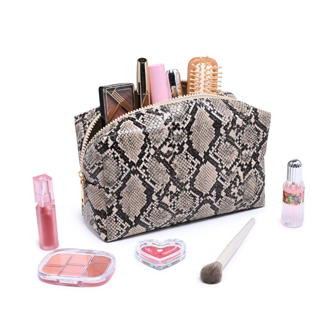 Woman wearing Natural Urban Essentials Snake Charmer Cosmetic & Travel Organizer Pouch 840504210051 View 1 | Natural