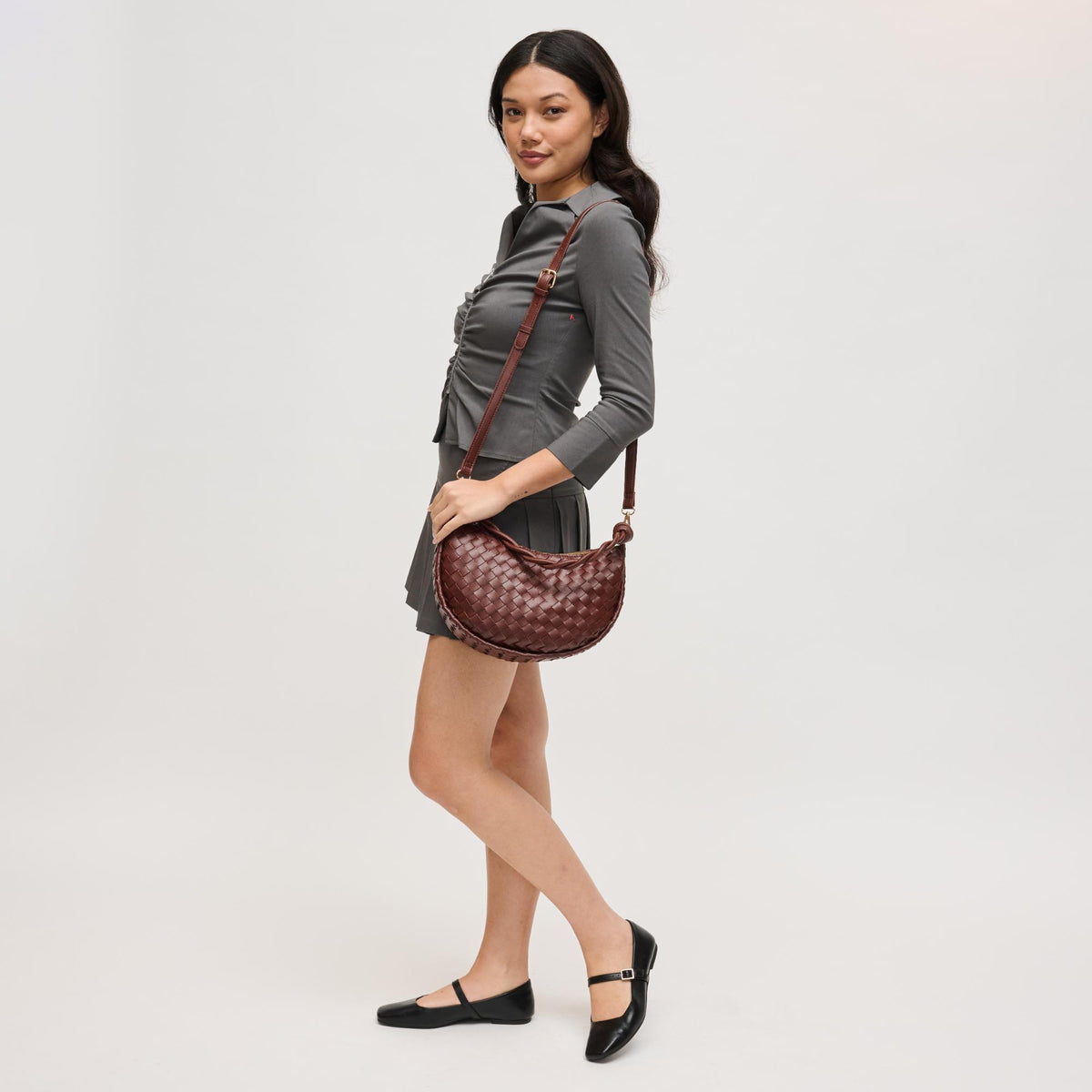 Woman wearing Chocolate Urban Expressions Violet Hobo 840504206597 View 2 | Chocolate
