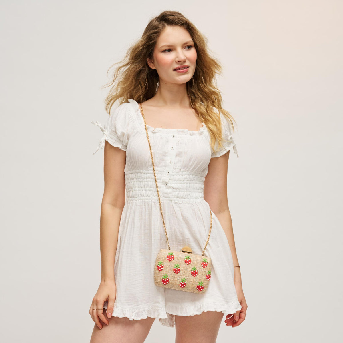 Woman wearing Strawberries Urban Expressions Pebbles Evening Bag 840504207945 View 2 | Strawberries