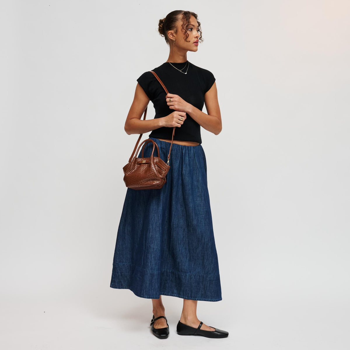 Woman wearing Cognac Urban Expressions Selena - Embossed Woven Crossbody 840504212154 View 4 | Cognac
