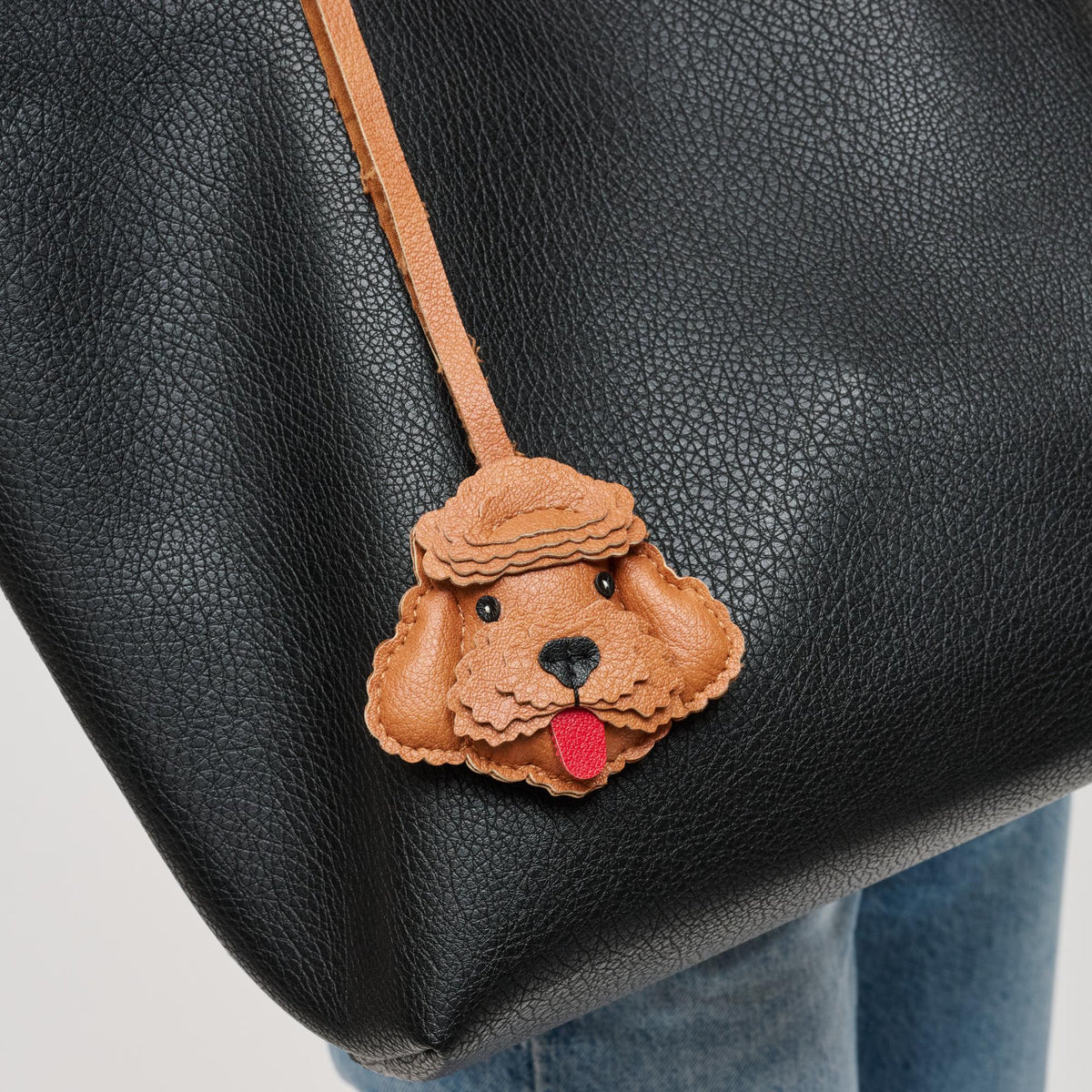 Woman wearing Tan Urban Expressions Tessie Keychain Charm 840504201073 View 1 | Tan
