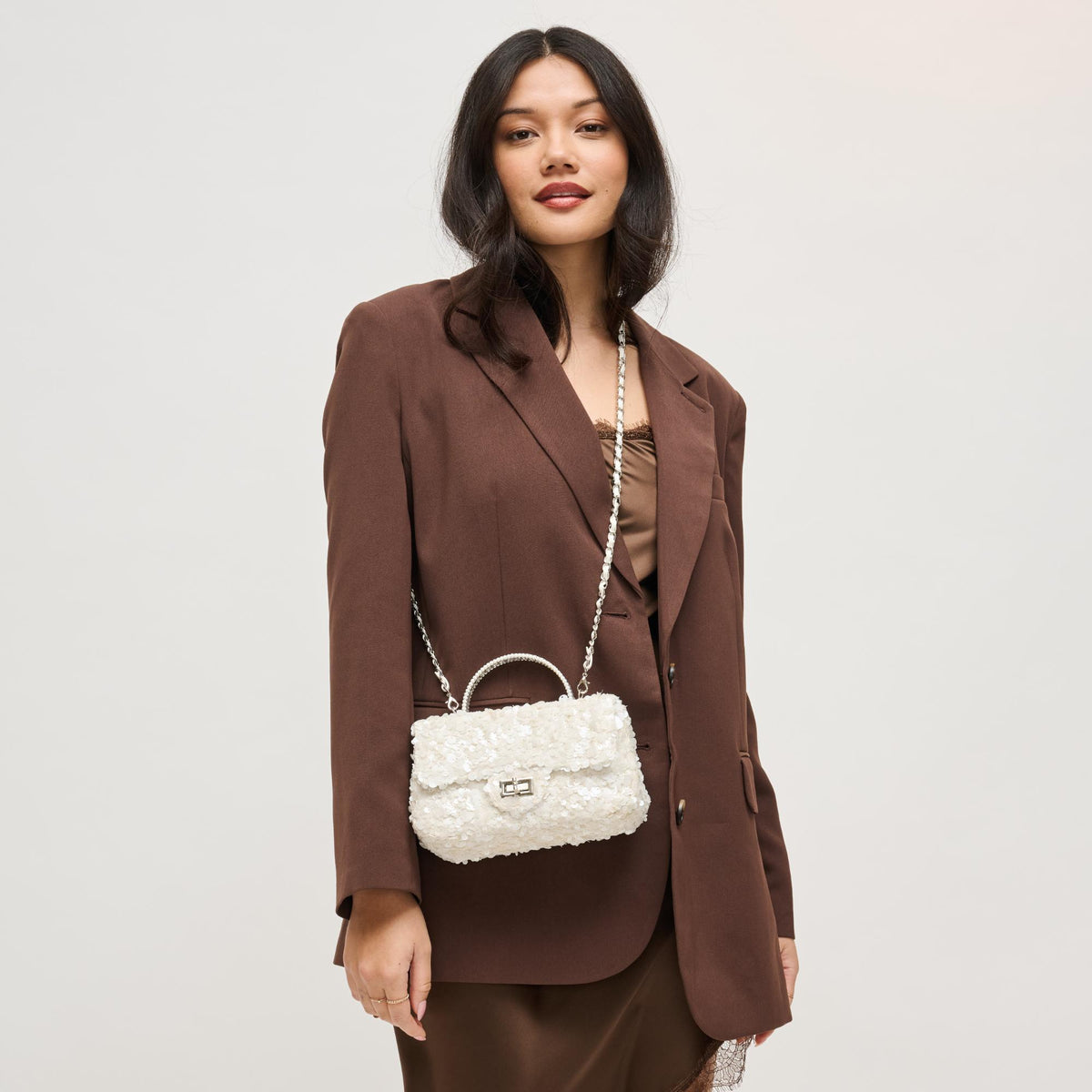 Woman wearing Ivory Urban Expressions Ella Evening Bag 840504204340 View 2 | Ivory