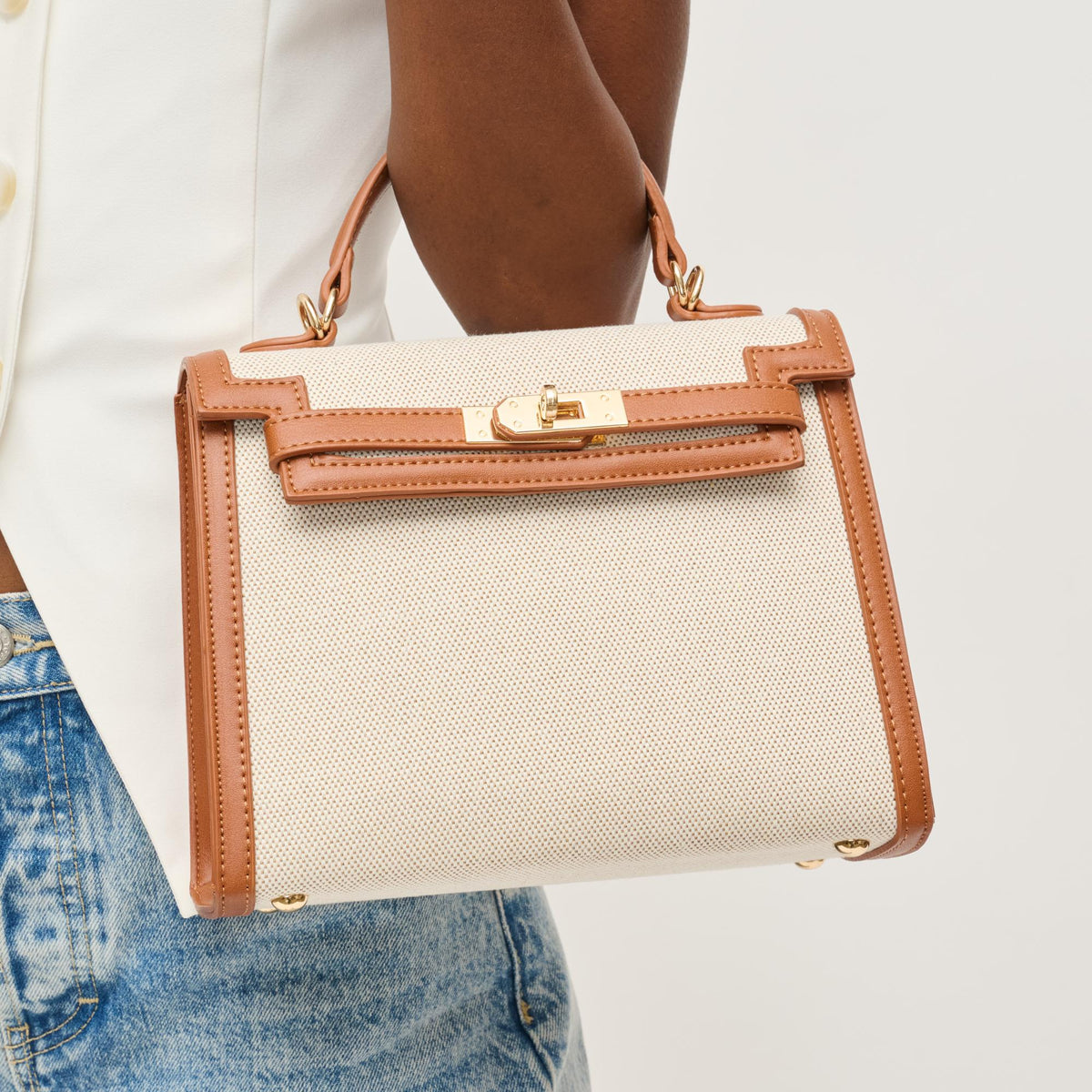 Woman wearing Tan Ivory Urban Expressions Cher Clutch 840611146311 View 1 | Tan Ivory