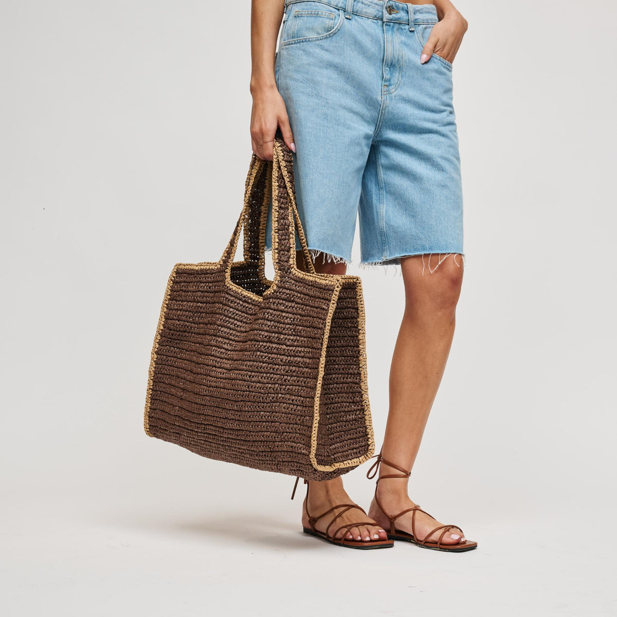 Woman wearing Chocolate Urban Expressions Enid Tote 840504211461 View 3 | Chocolate