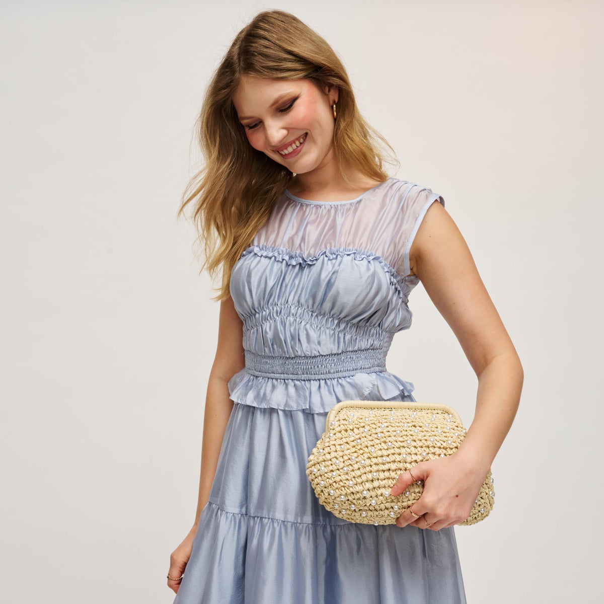 Woman wearing Ivory Urban Expressions Whitlow Clutch 840504209345 View 2 | Ivory