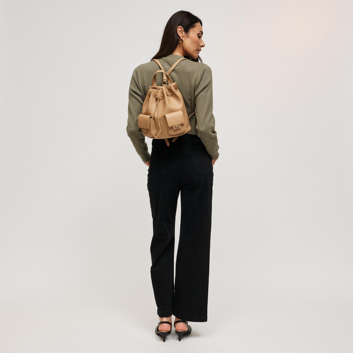 Woman wearing Natural Urban Expressions Clearfield Backpack 840504212383 View 4 | Natural