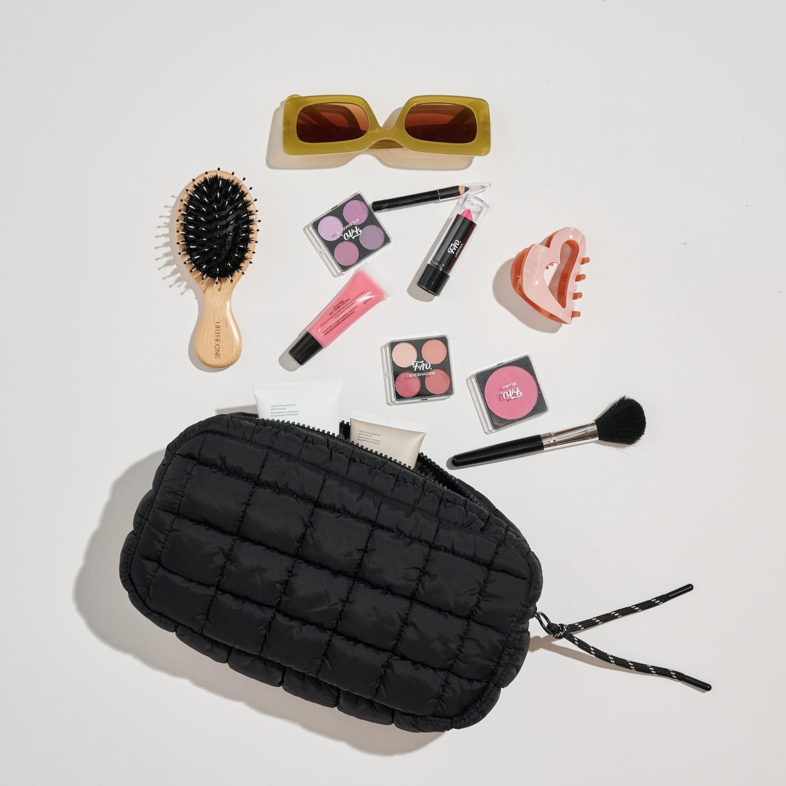 Woman wearing Periwinkle Urban Expressions Cloud Nine - Quilted Puffer Nylon Cosmetic Pouch 840611143785 View 1 | Periwinkle