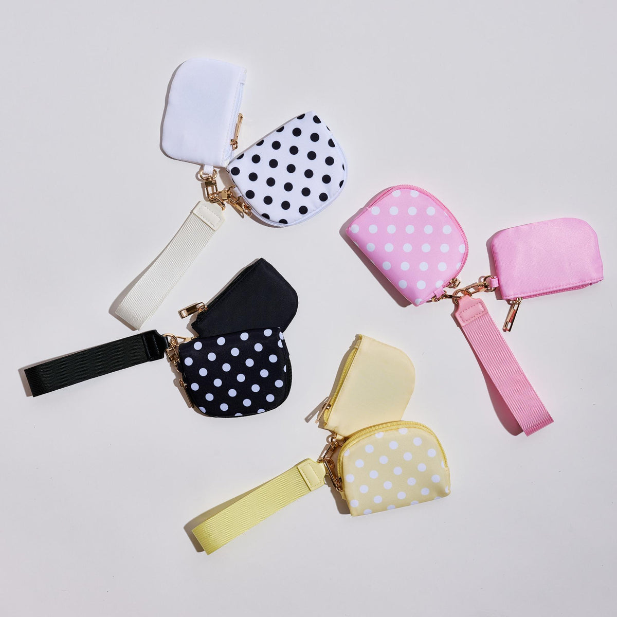 Woman wearing White Urban Expressions Link & Carry - Polka Dot Wristlet 840504202735 View 3 | White